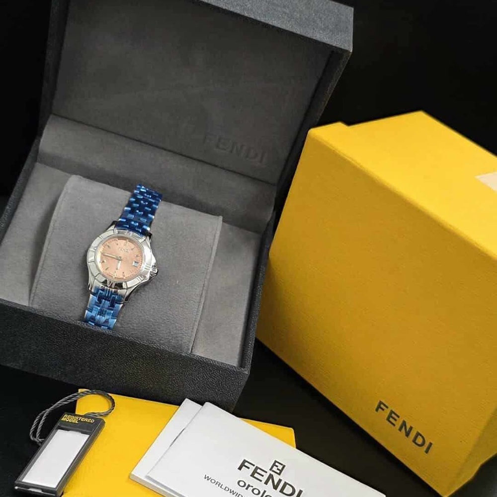 Fendi silver with pink face watch.